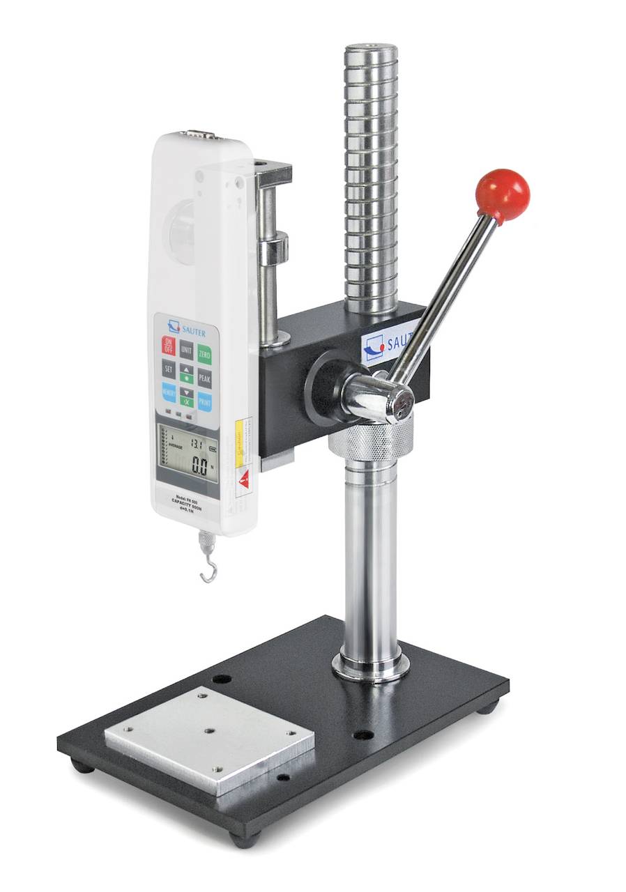Messgerät zur Materialprüfung mit digitalem Display und Hebel, das zur Messung von Druck- oder Zugkraft verwendet wird.
