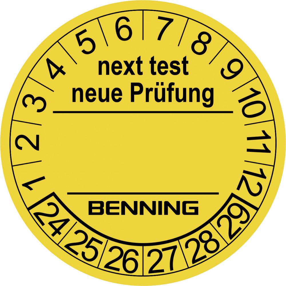 Gelber Prüfplakettenaufkleber mit der Aufschrift 'next test neue Prüfung' und 'BENNING', Zahlen von 1 bis 12, Monate für Termin.
