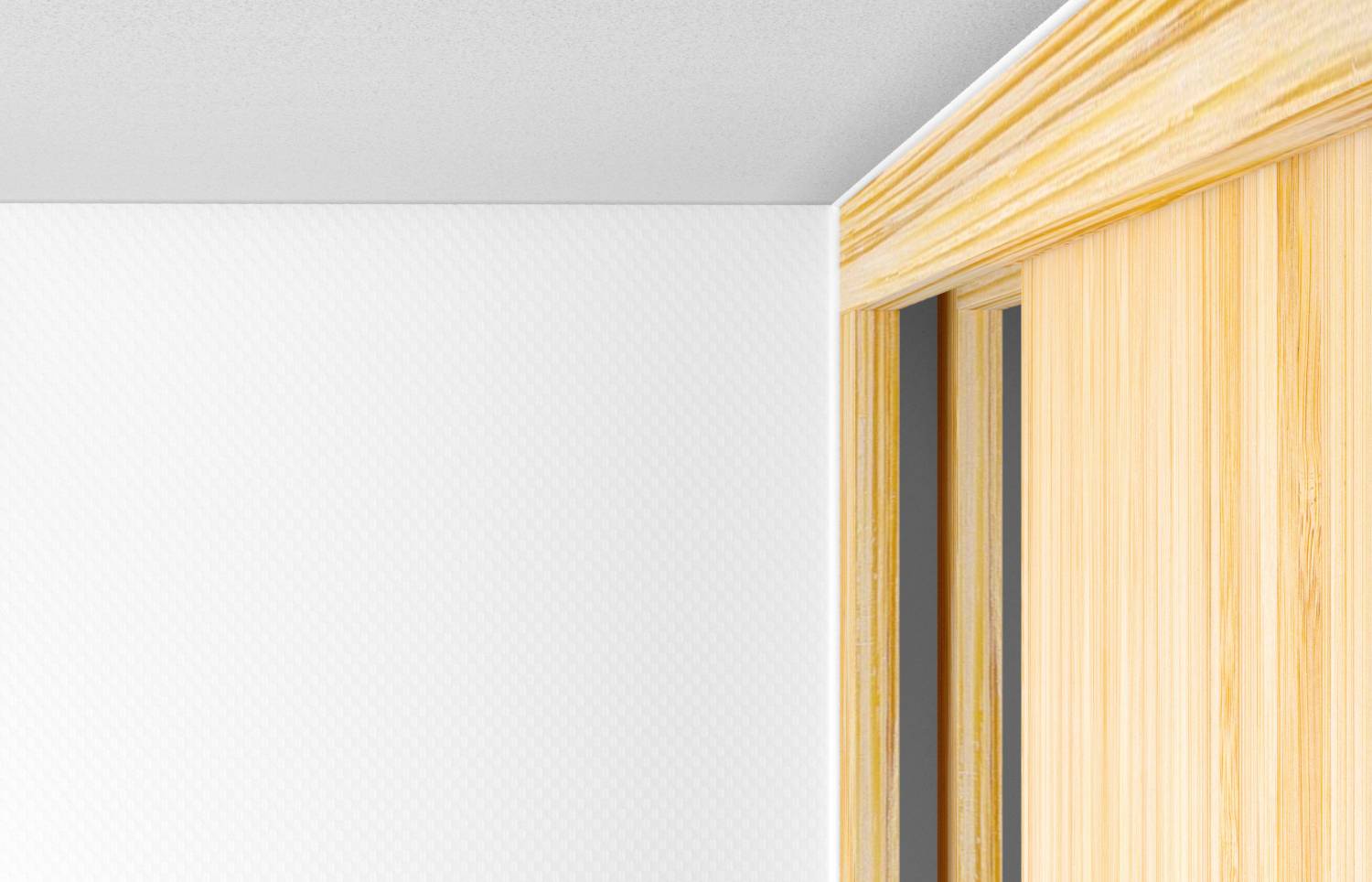Ecke eines Raumes mit weißer Tapete und hölzerner Schiebetür rechts. Deutet minimalistisches Design mit warmem Holzeinsatz an.
