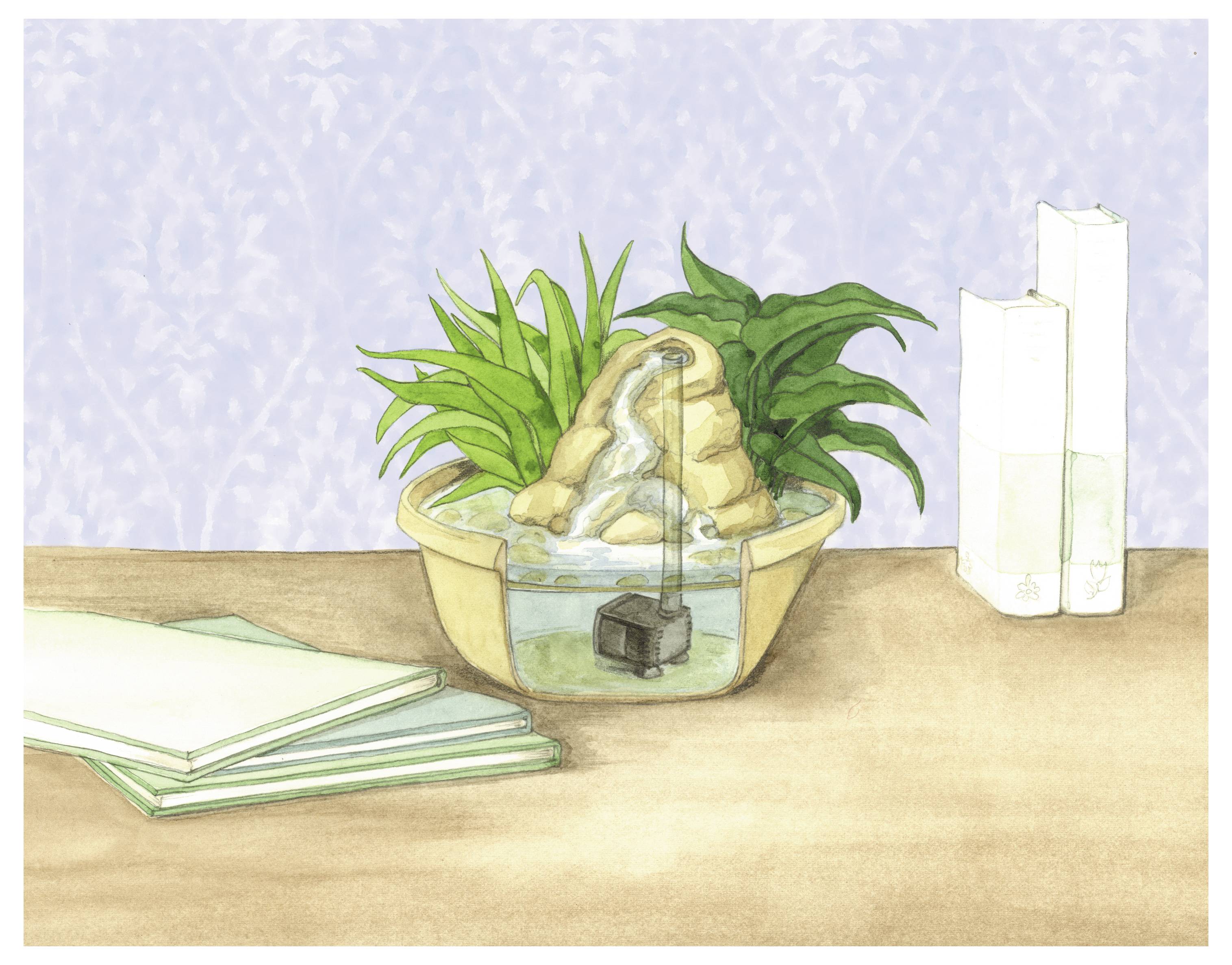 Ein kleiner Tisch-Wasserbrunnen mit Steinen und grünen Pflanzen steht auf einer Holzoberfläche neben geschlossenen Büchern und zwei Buchstützen.