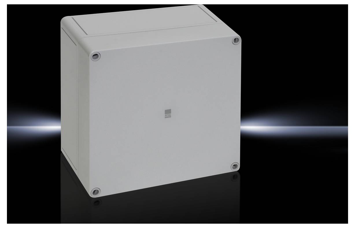 Graues quadratisches Gehäuse vor schwarzem Hintergrund, mit abgerundeten Ecken und vier Schrauben an den Ecken sichtbar.