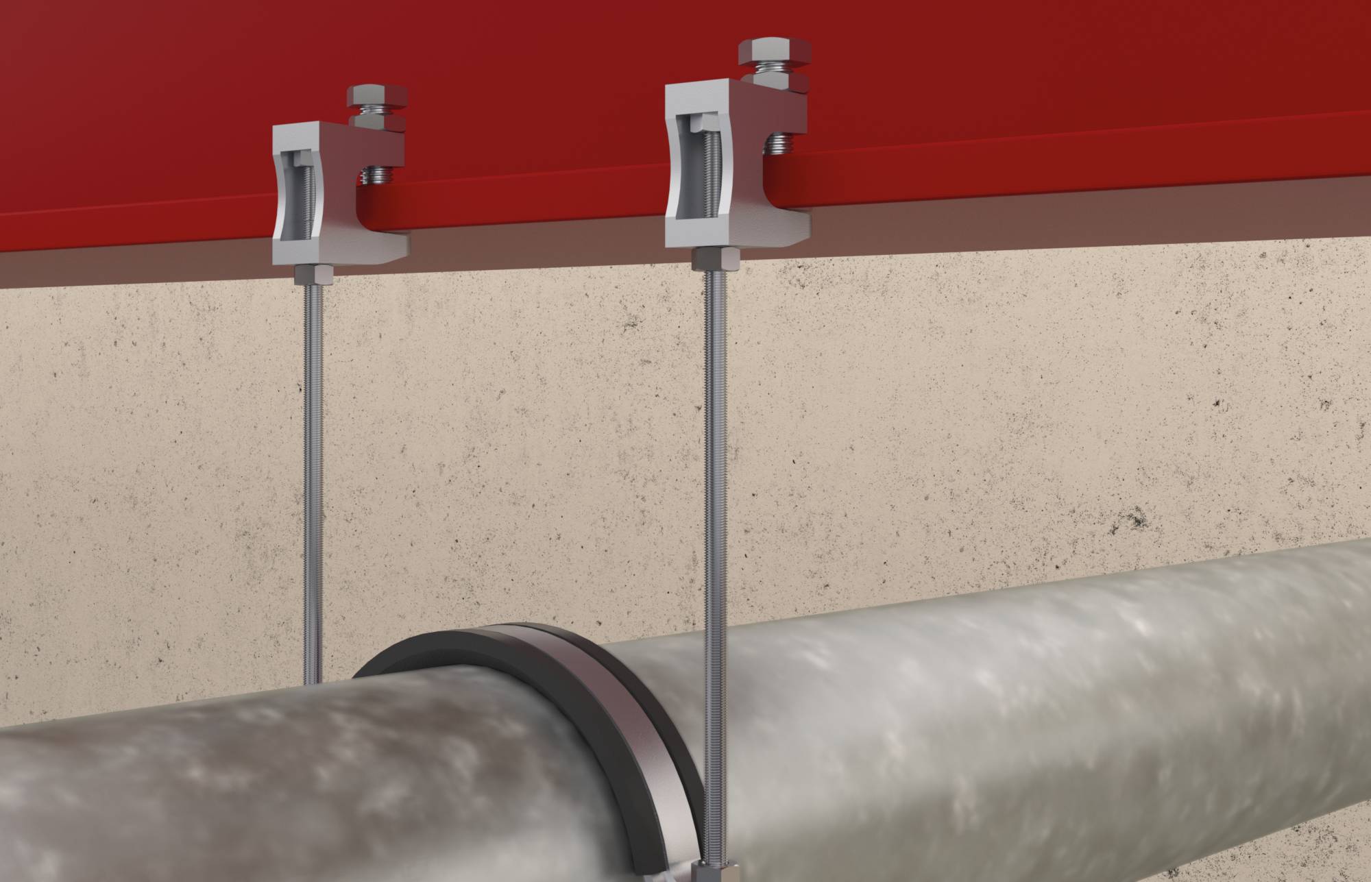 Zwei Metallaufhänger suspendieren ein großes Rohr von einem roten Deckenträger gegen eine Betonwand.