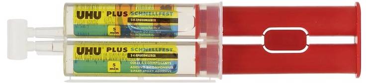 Doppelkammerspritze mit 'UHU Plus Schnellfest' Aufschrift und rotem Griff. Enthält Epoxidharzkleber für schnelles und starkes Kleben.