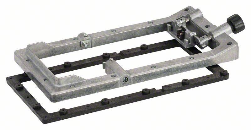 Ein metallischer Bohrrahmen mit Einstellknopf und Schraubklemmen, verwendet zur präzisen Ausrichtung beim Bohren von Oberflächen.