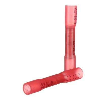 Zwei rote elektrische Kabelverbinder. Einer steht aufrecht, der andere liegt seitlich davor. Sie sind zylindrisch und durchsichtig.