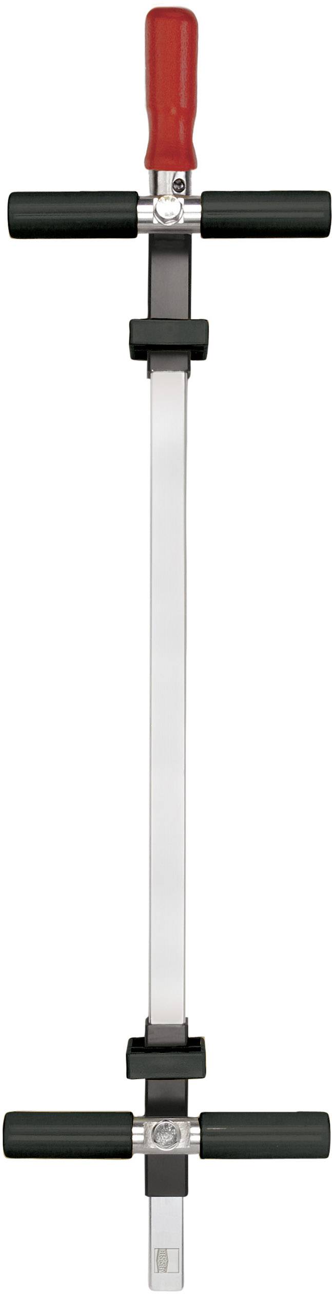 Ein T-förmiger Drehmomentschlüssel mit rotem Griff oben und einem langen silbernen Stab in der Mitte, zwei schwarze Griffe an den Seiten.