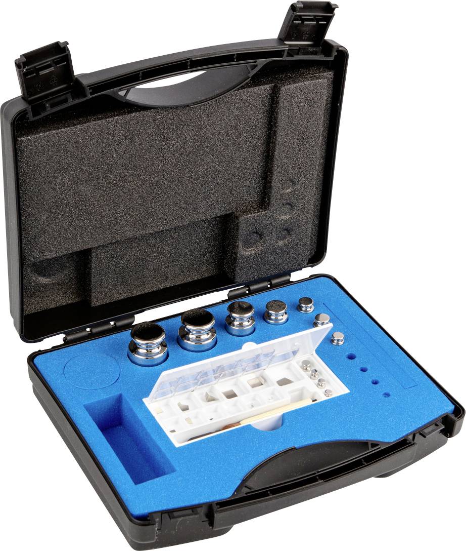 Offener schwarzer Koffer mit blauem Schaumstofffach, das mehrere runde Metallgewichte und eine weiße Box zur Aufbewahrung enthält.