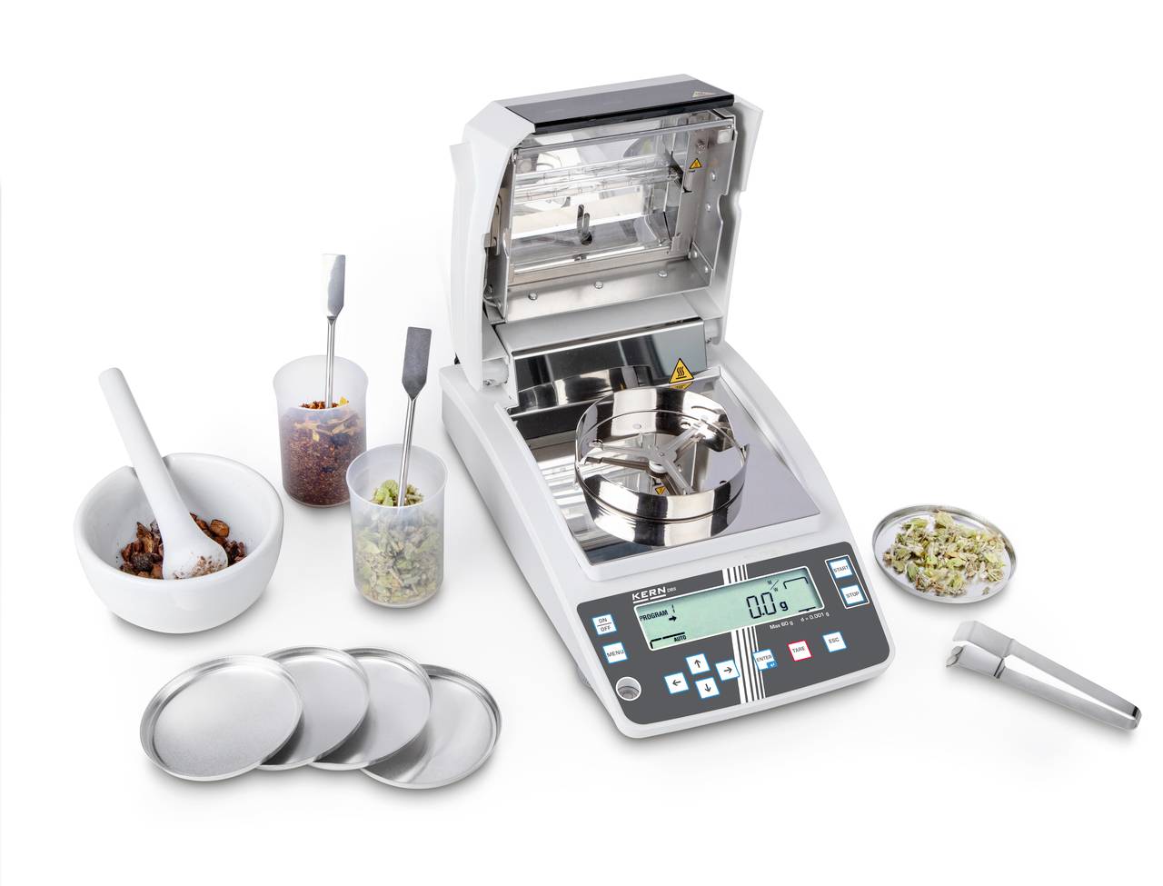 Feuchtigkeitsanalysator mit digitalem Display und mehreren Probenbehältern.