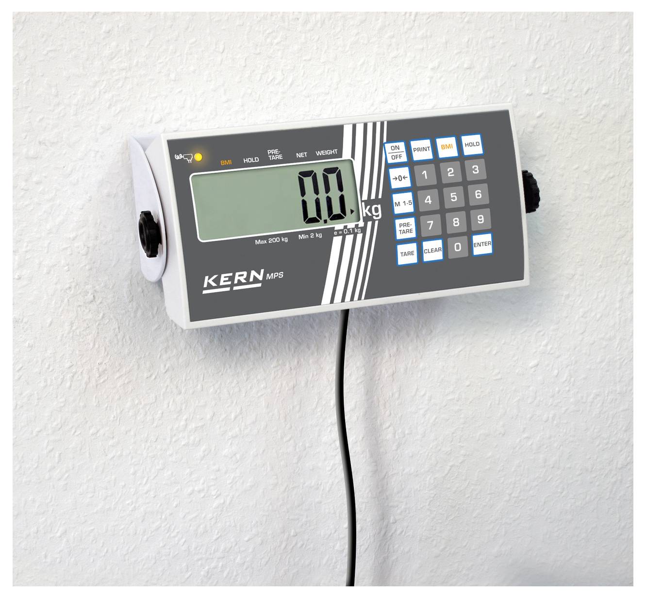 Anzeigegerät einer Waage an der Wand mit digitalem Display, zeigt '0,0 kg'. Tasten für Tarieren und Gewichtsspeicherung.