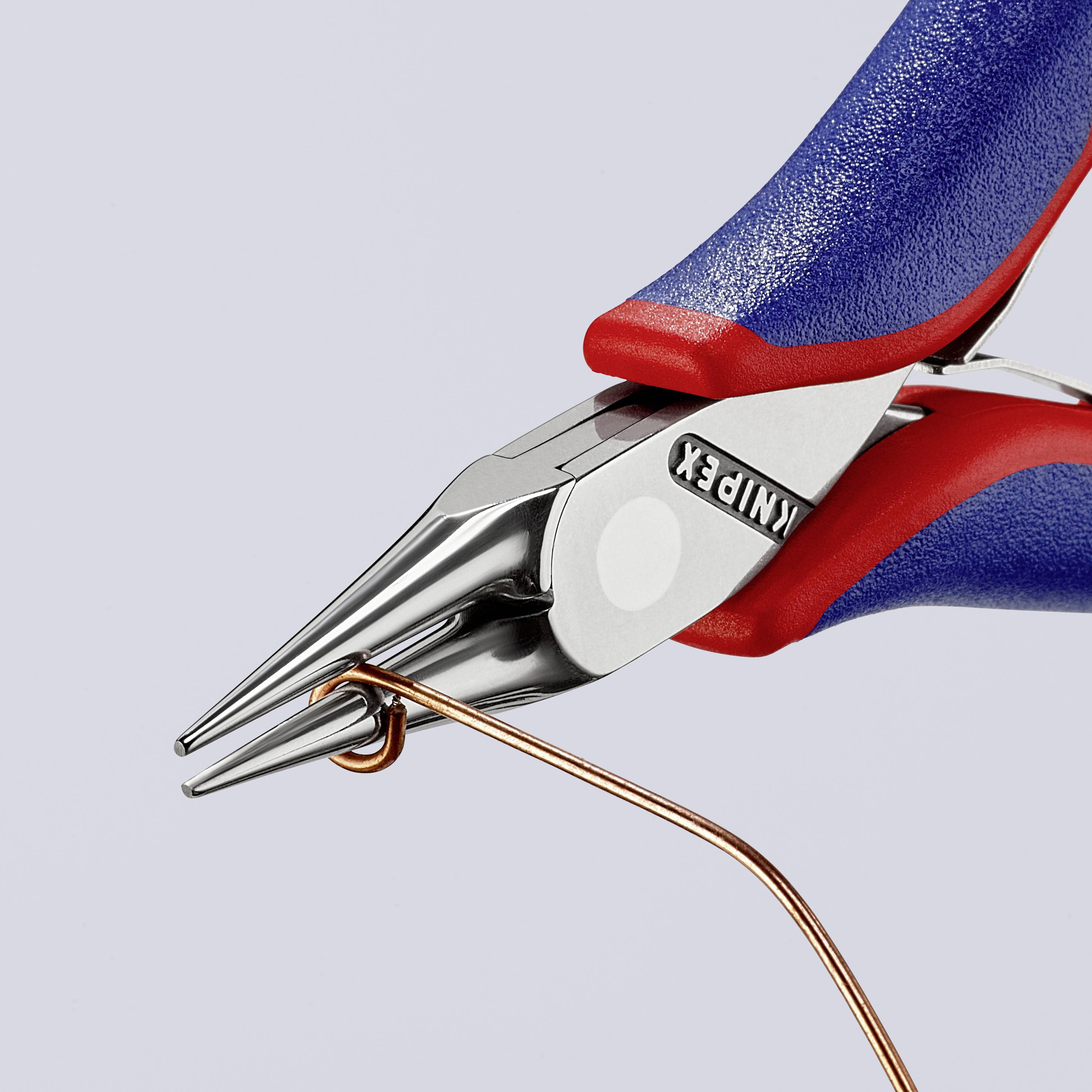 Eine rote und blaue Zange biegt einen braunen Draht. Die Zange ist von der Marke 'Knipex'.