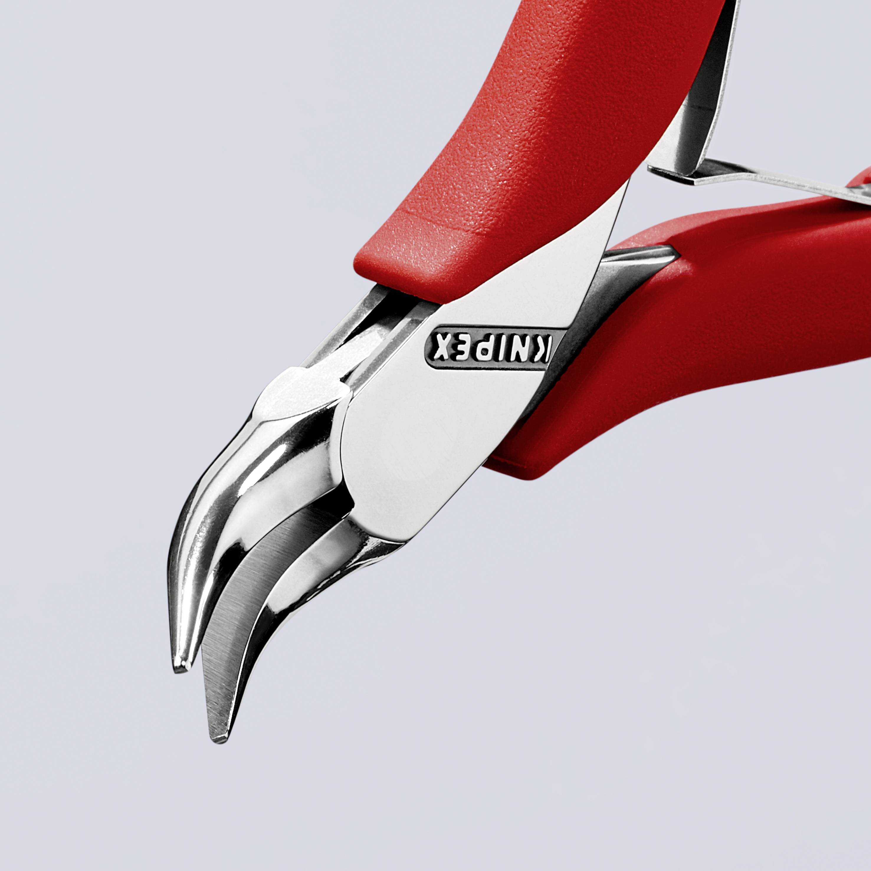 Rote Knipex-Zange mit geschwungenen Klingen, Nahaufnahme der Werkzeuge für präzises Schneiden und Handarbeiten.