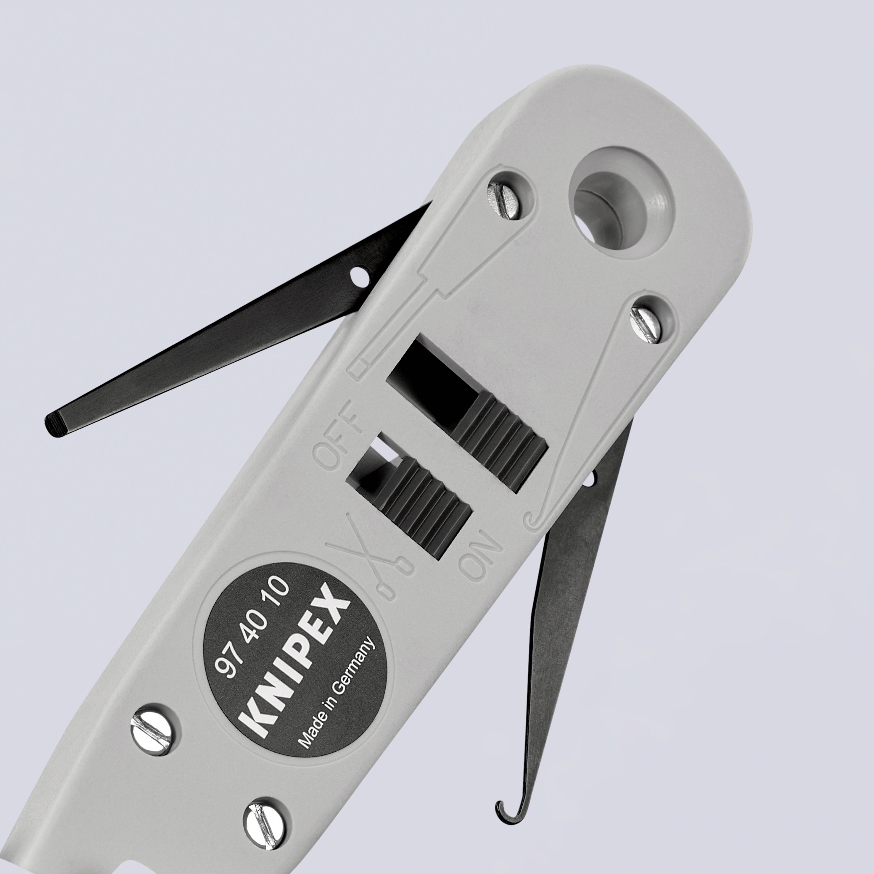 Werkzeug zum Abisolieren von Kabeln, Modell 'Knipex 9740 10', mit Schieberegler für Öffnen und Schließen, hergestellt in Deutschland.