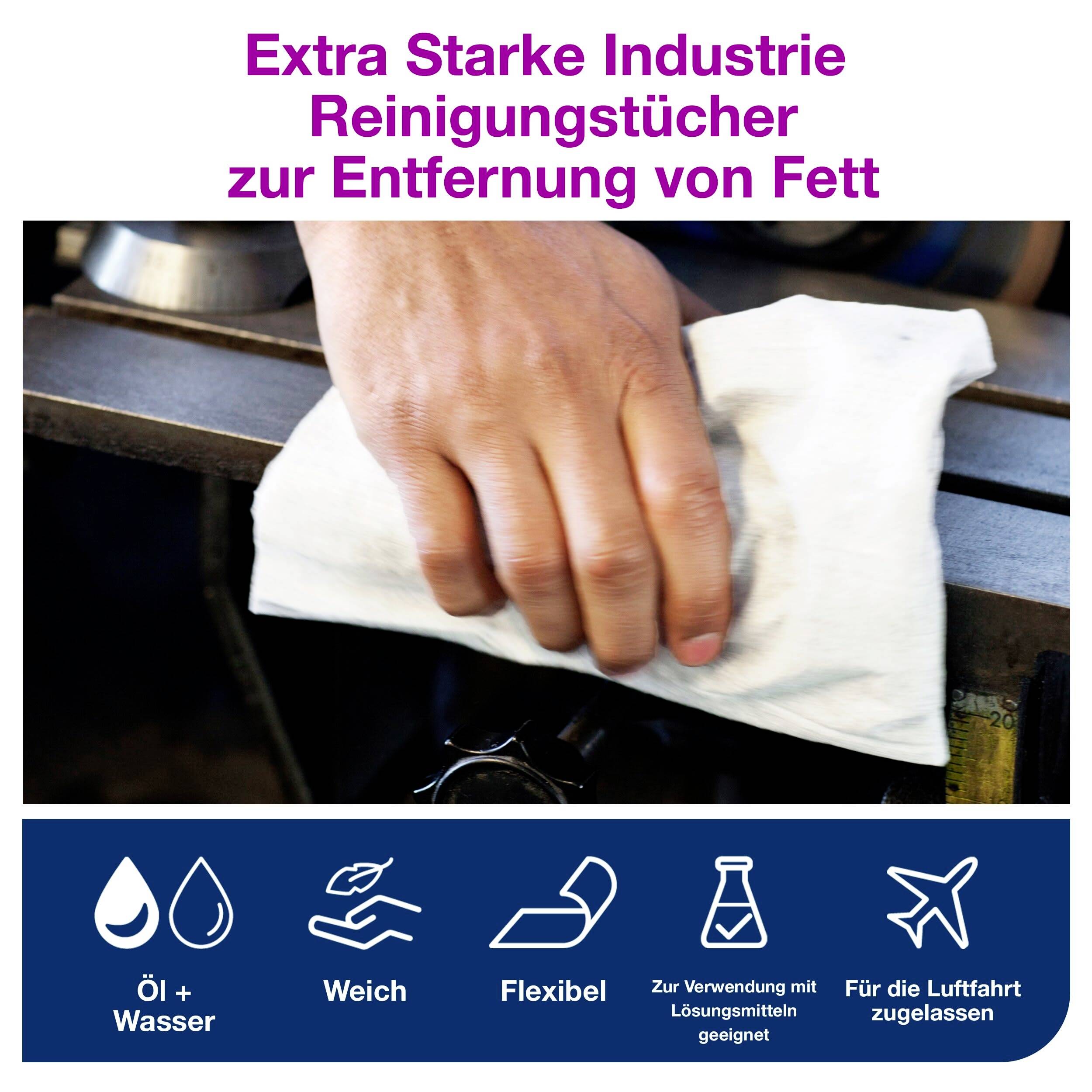 Hand wischt mit weißem Tuch über ölige Oberfläche. Text oben: Extra Starke Industrie Reinigungstücher zur Entfernung von Fett.