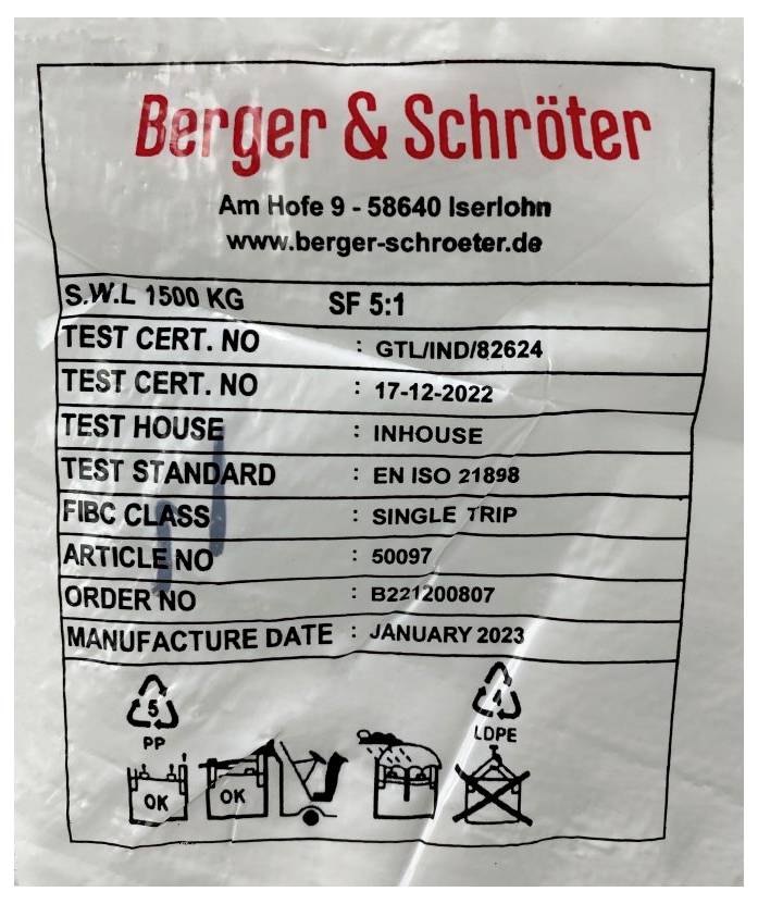 Etikett mit Angaben: 'Berger & Schröter', Ort, Webseite. Daten zu SWL, Testzertifikaten, FIBC-Klasse, Artikelnummer und Produktionsdatum. Symbole, darunter Recycling- und Warnhinweise.