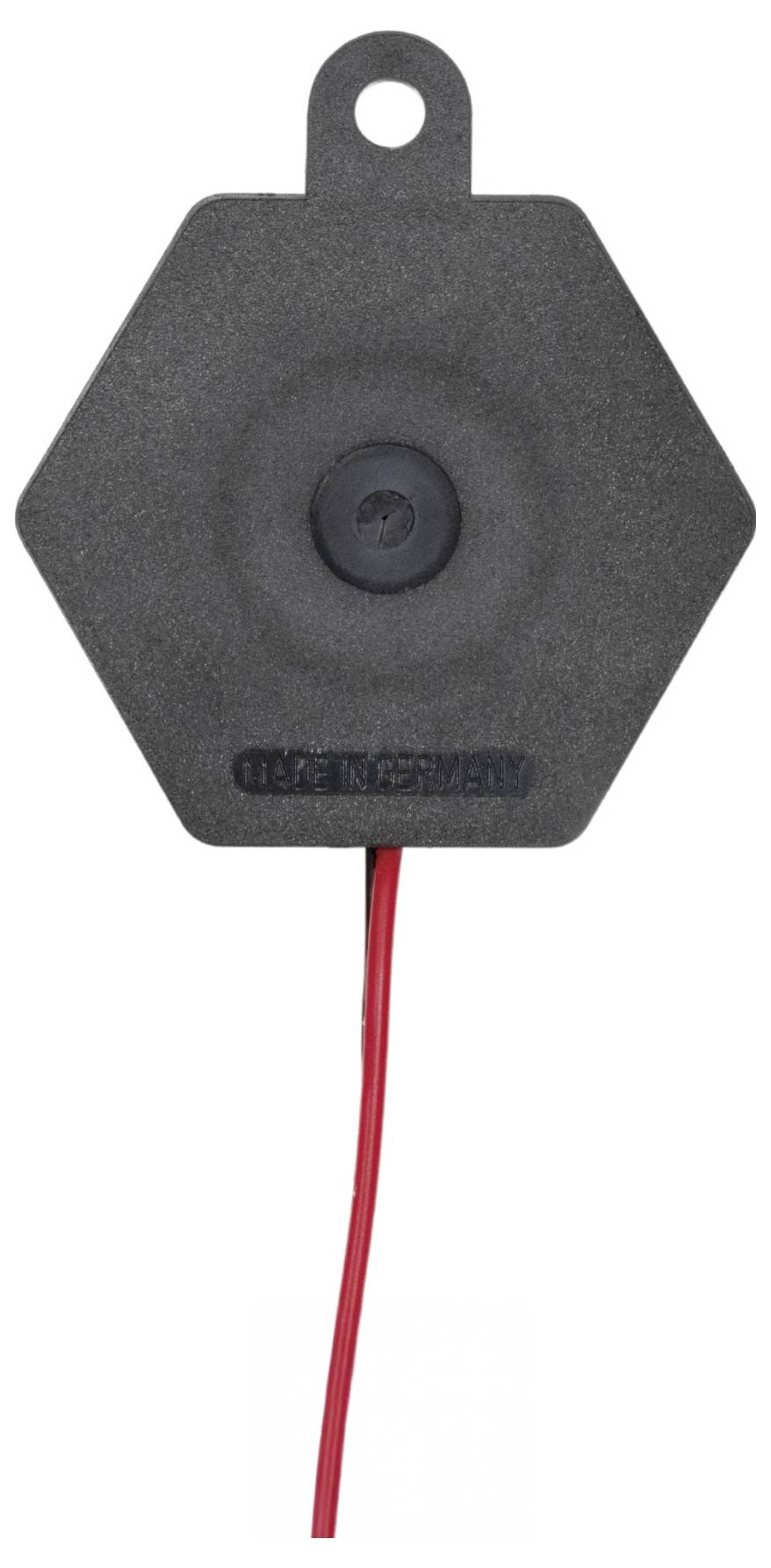 Ein sechseckiger schwarzer Sensor mit einem roten Kabel unten.