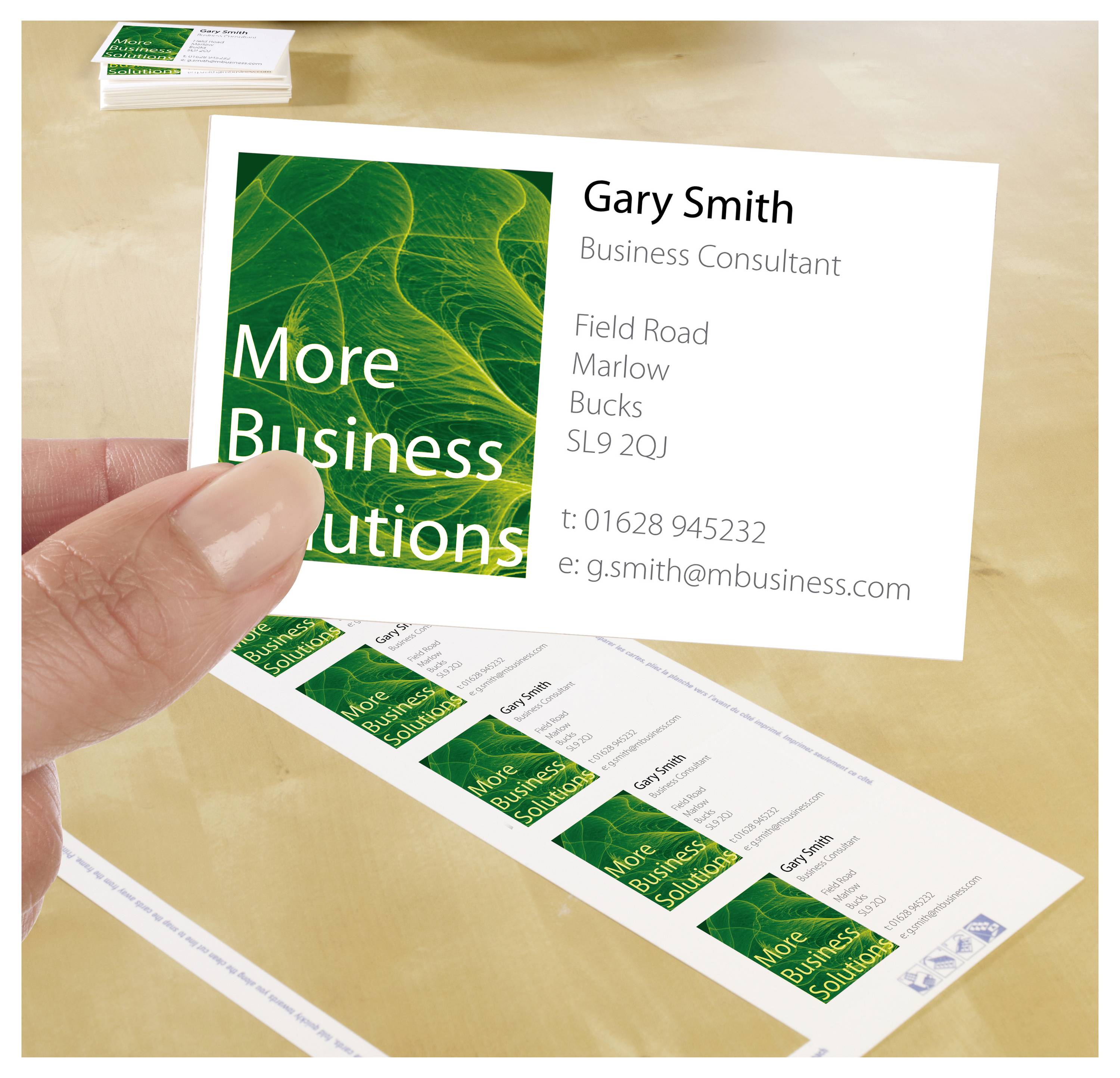 Visitenkarte mit grünem Logo 'More Business Solutions'; Kontakt von Gary Smith, Business Consultant, mit Adresse, Telefon und E-Mail.