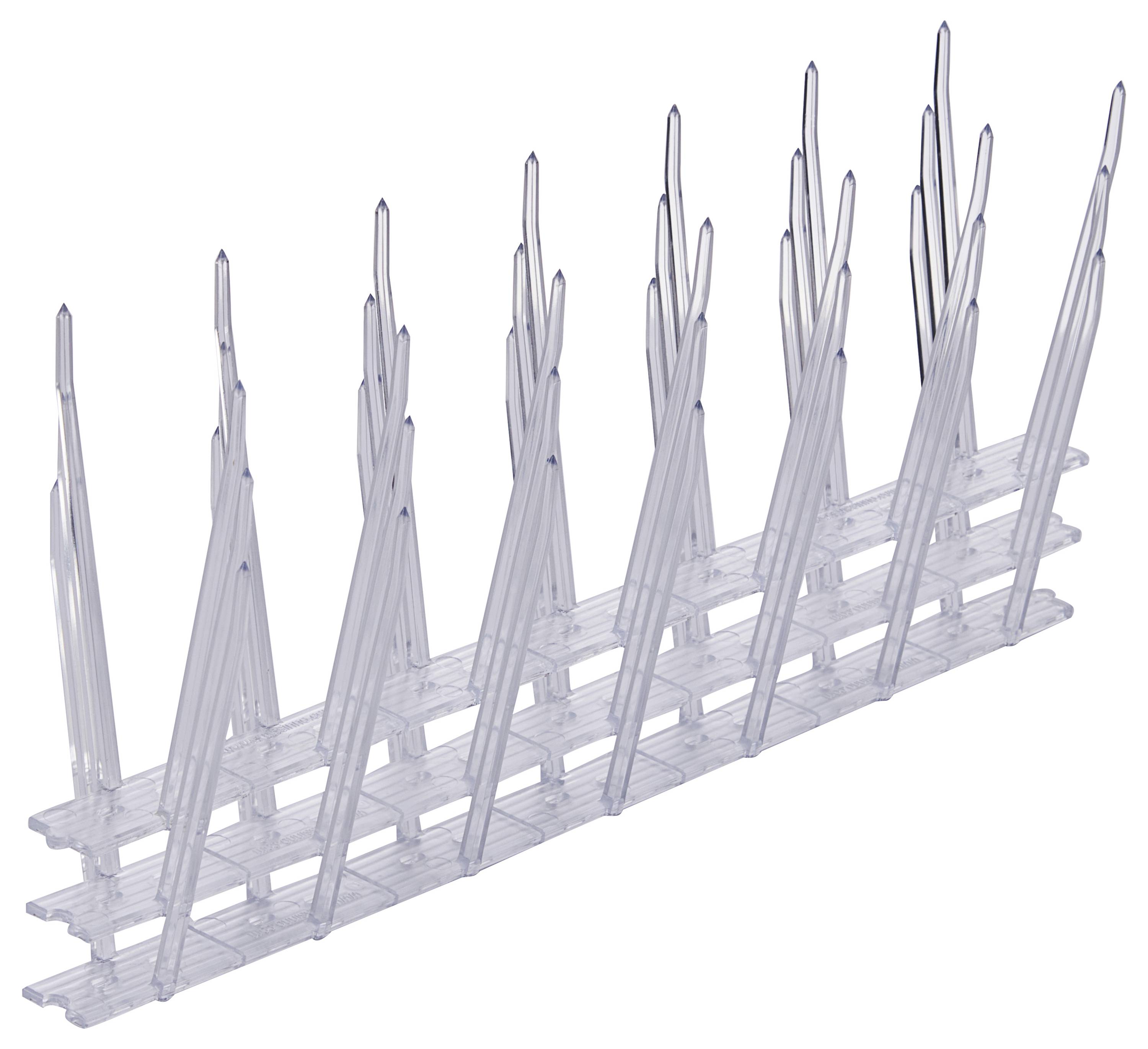 Plastic bird deterrent spikes arranged in a triangular, upward-pointing pattern, designed to prevent birds from perching on surfaces.