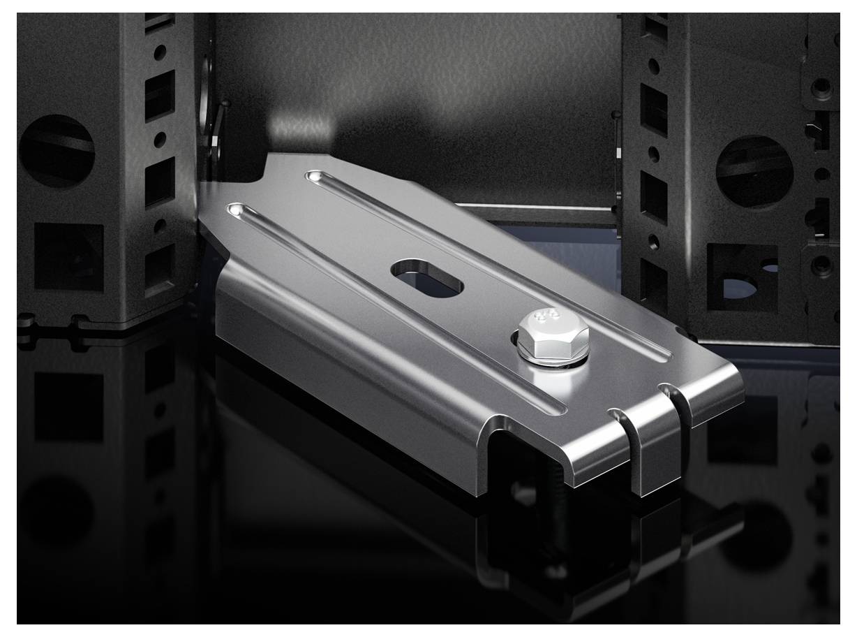 Ein silbernes Metallteil mit einer Schraube in der Mitte liegt auf einer spiegelnden Oberfläche. Es ist von dunklen Strukturen umgeben.