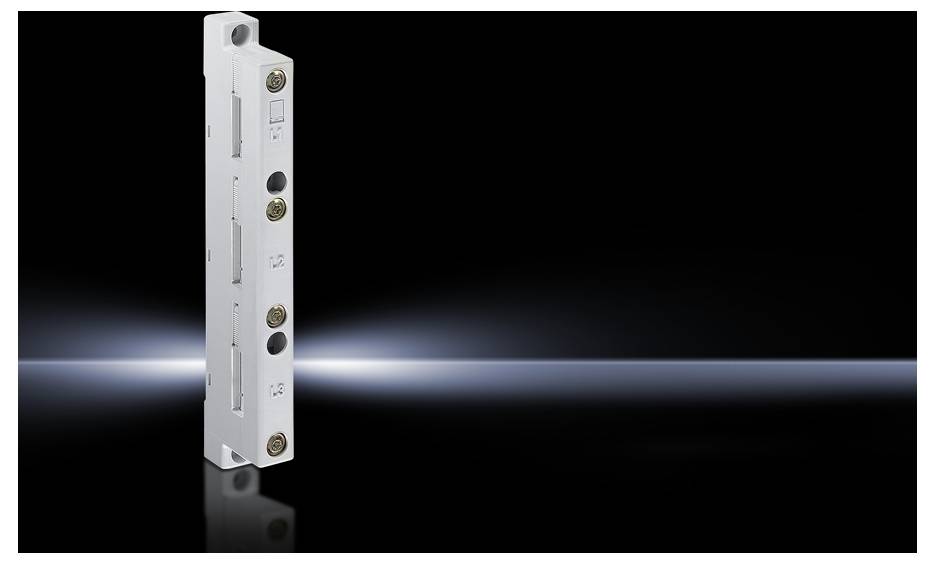 'Sicherheitsverriegelung' auf schwarzem, leuchtendem Hintergrund. Zeigt ein vertikales, metallisches Gerät mit Knöpfen und Schlitzen.