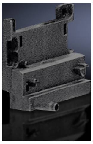 Ein schwarzes, rechteckiges, industrielles Bauteil auf schwarzem Hintergrund, möglicherweise ein mechanisches Teil oder Gehäuse.