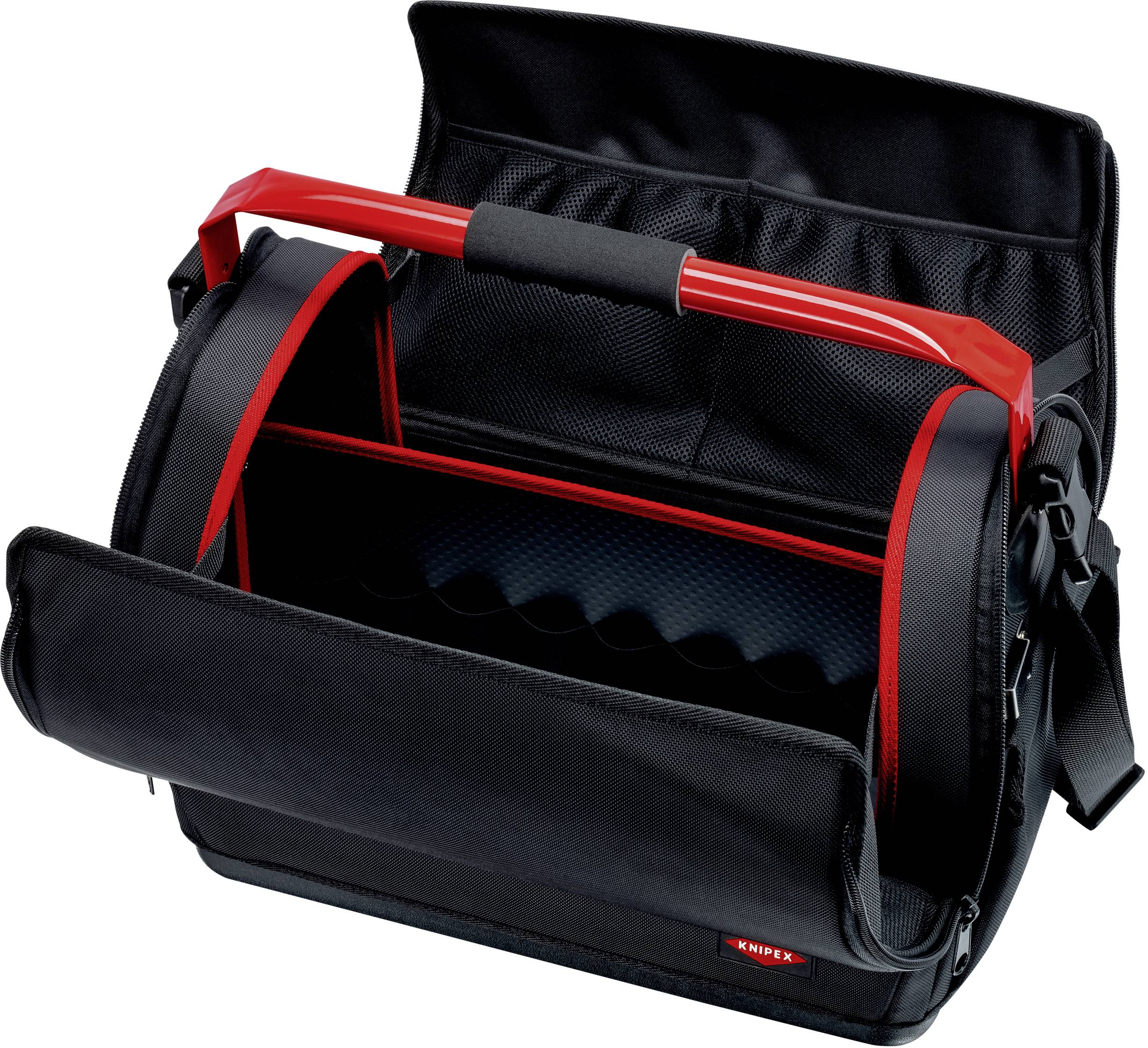 Schwarze Werkzeugtasche mit rotem Griff, geöffnet mit mehreren Fächern. Geeignet zur sicheren Aufbewahrung von Werkzeugen.