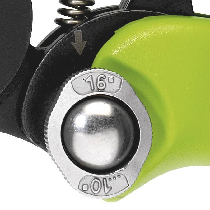 Nahaufnahme einer grünen und schwarzen Ratschenmechanik mit einer Beschriftung '10° 16°' auf einer metallischen Scheibe.