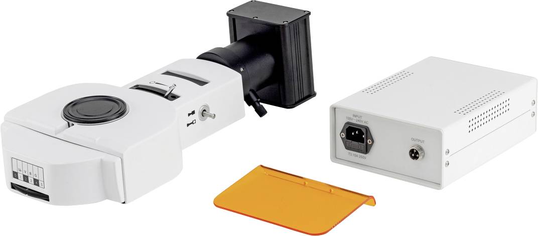 Ein medizinisches Gerät zur Untersuchung von Hautveränderungen, bestehend aus einem Handteil, einer Steuerbox und einem orangefarbenen Filter.