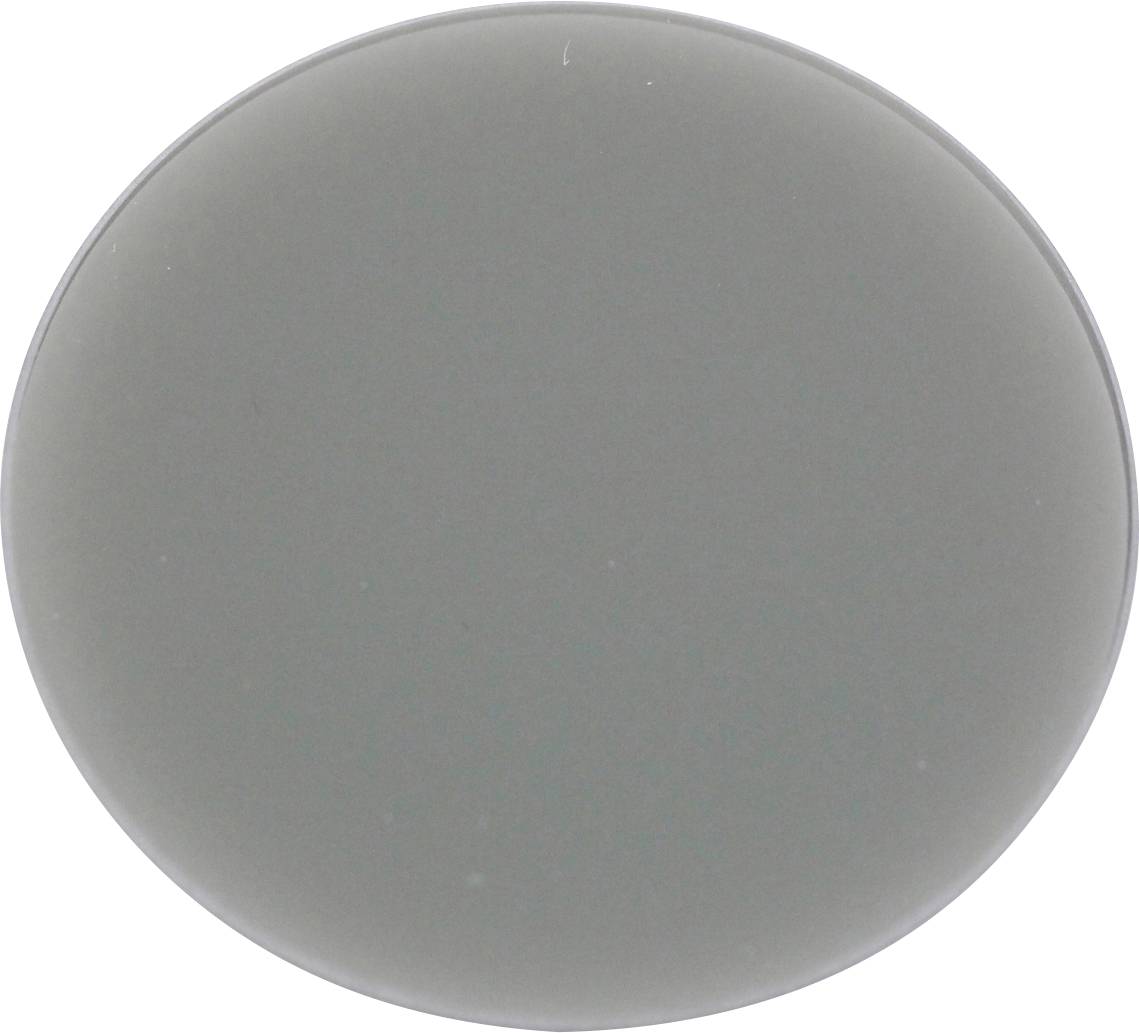 Eine graue runde Scheibe, möglicherweise eine Linse oder ein Filter, vor einem neutralen Hintergrund.