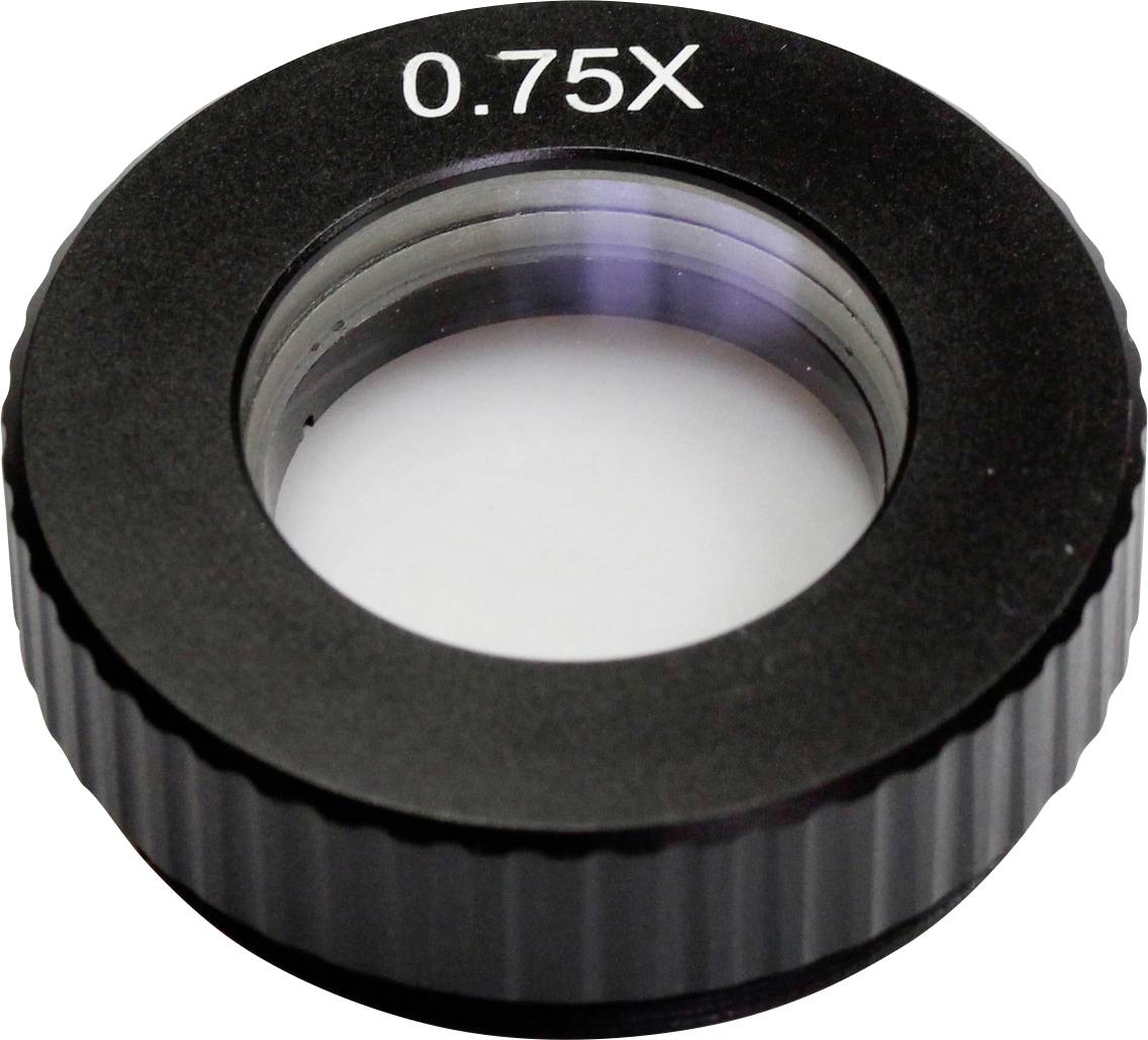 Eine schwarze Vergrößerungslinse mit der Aufschrift '0.75X', die auf eine weiße Oberfläche liegt.