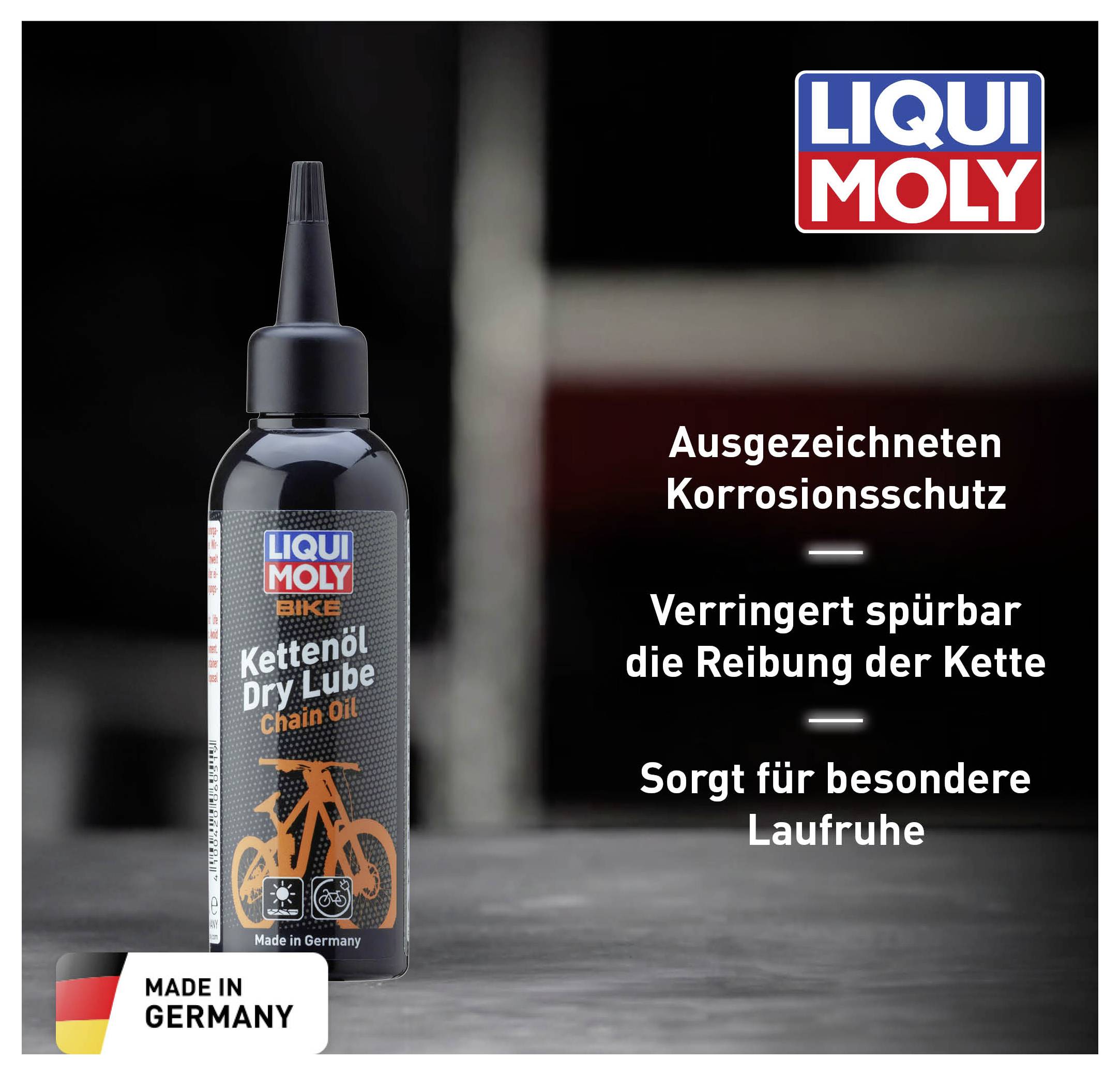 Eine Flasche LIQUI MOLY Kettenöl auf einem Tisch. Text: 'Ausgezeichneten Korrosionsschutz. Verringert spürbar die Reibung der Kette. Sorgt für besondere Laufruhe.' Made in Germany.