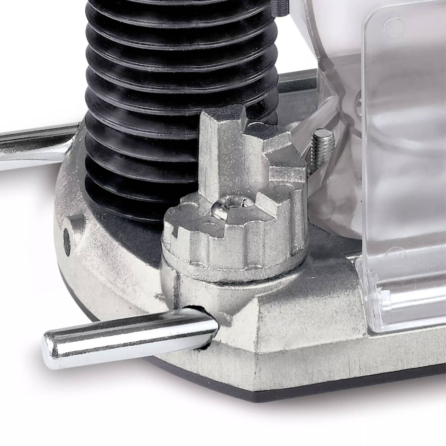 Ein Teil einer Metallmaschine mit einem Hebel und Zahnrädern. Der Hintergrund ist unscharf und zeigt weitere Maschinenelemente.