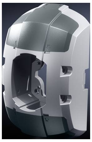 Graues, futuristisches Maschinenteil mit symmetrischen Aussparungen und glatter Oberfläche, möglicherweise Teil eines größeren Geräts.