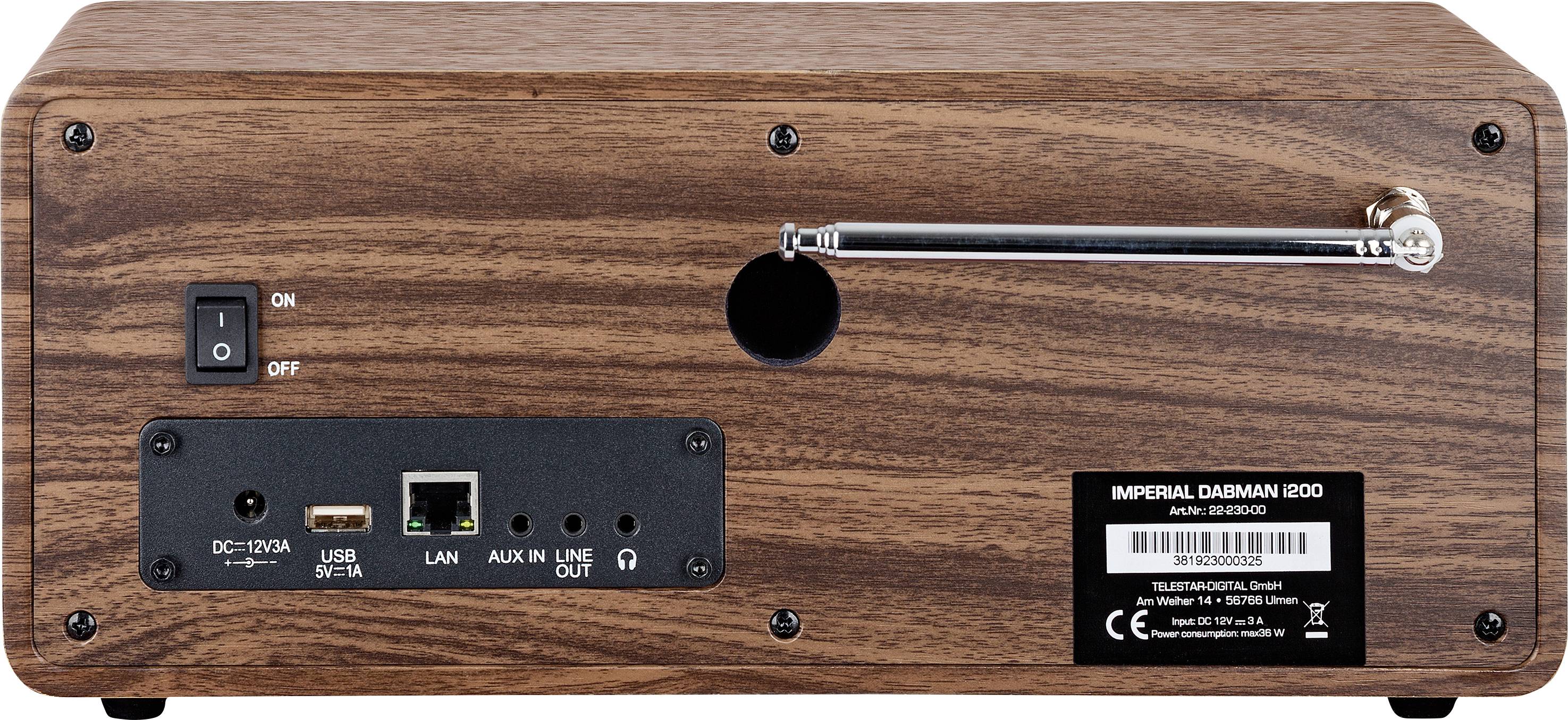 Rückseite eines Holzradios mit Antenne, Netzschalter, LAN-Port, USB, AUX in/out und Stromanschluss. Modell: 'IMPERIAL DABMAN i200'.