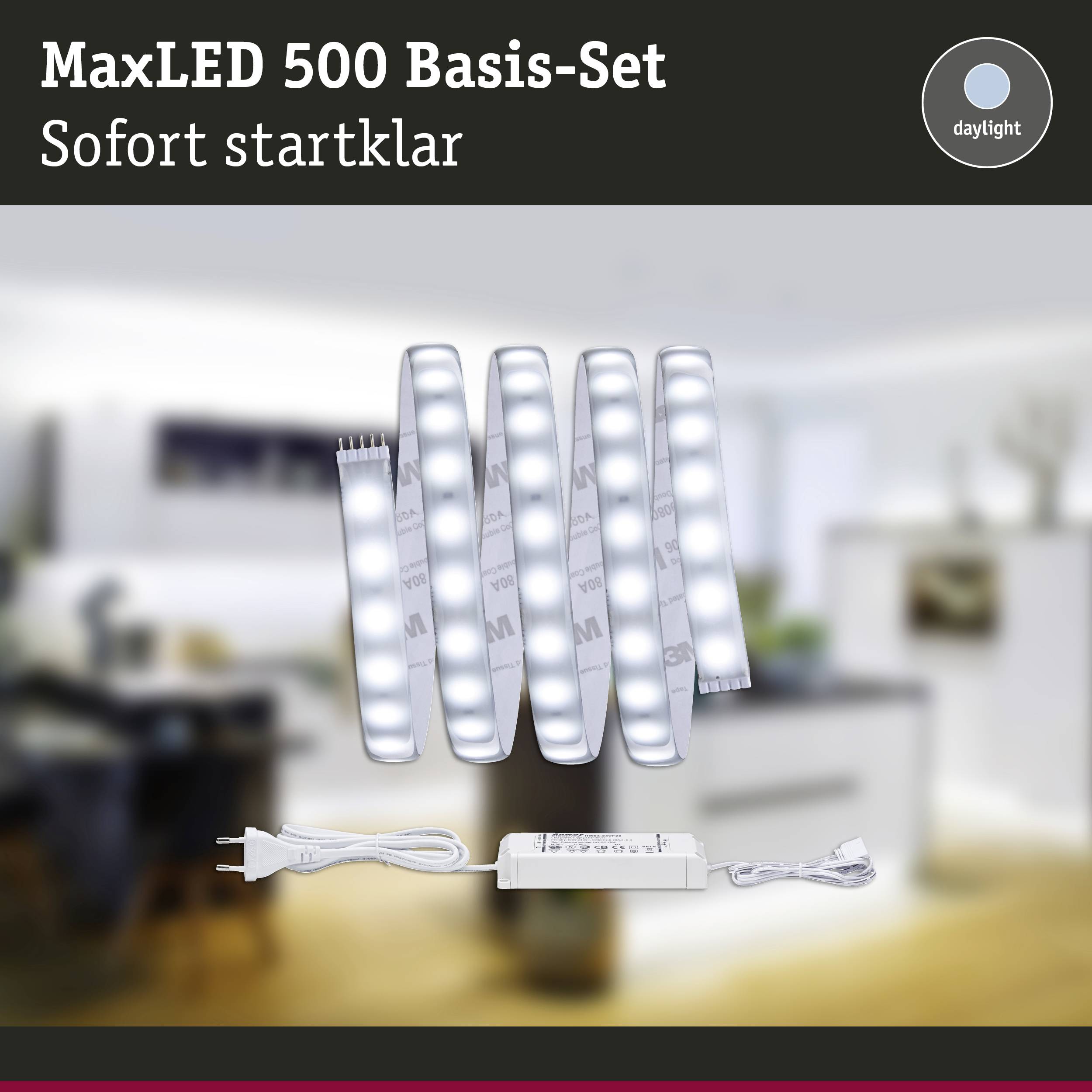 'MaxLED 500 Basis-Set', LED-Lichtstreifen und Netzteil vor unscharfem Wohnambiente. Text: 'Sofort startklar', 'daylight'.