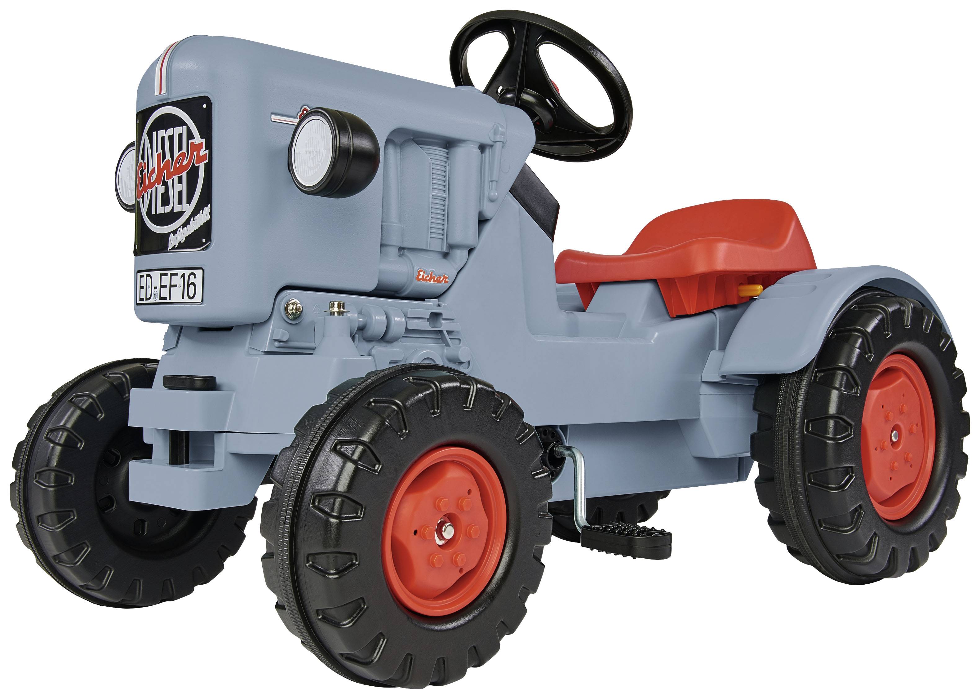 Ein Spielzeugtraktor in Blau und Rot, mit großen schwarzen Rädern und einem Lenkrad. Geeignet für Kinder, um im Freien zu fahren.