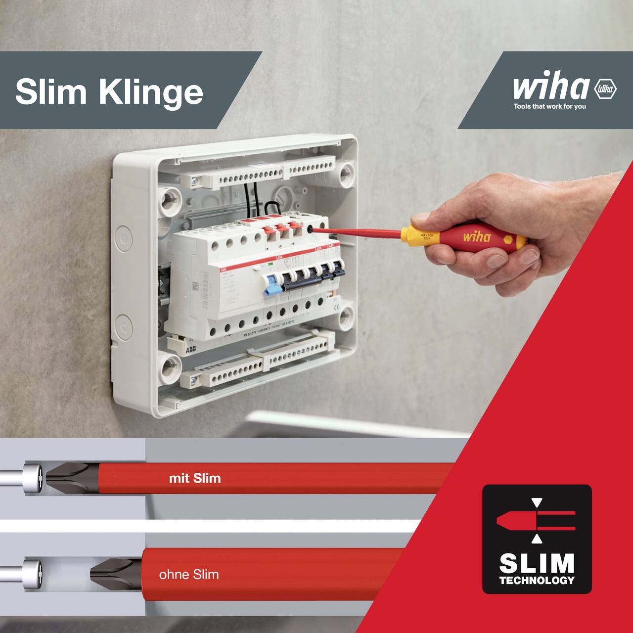 Eine Hand verwendet einen roten Schraubendreher, um an einer geöffneten elektrischen Schalttafel zu arbeiten. Wiha Slim Klinge.
