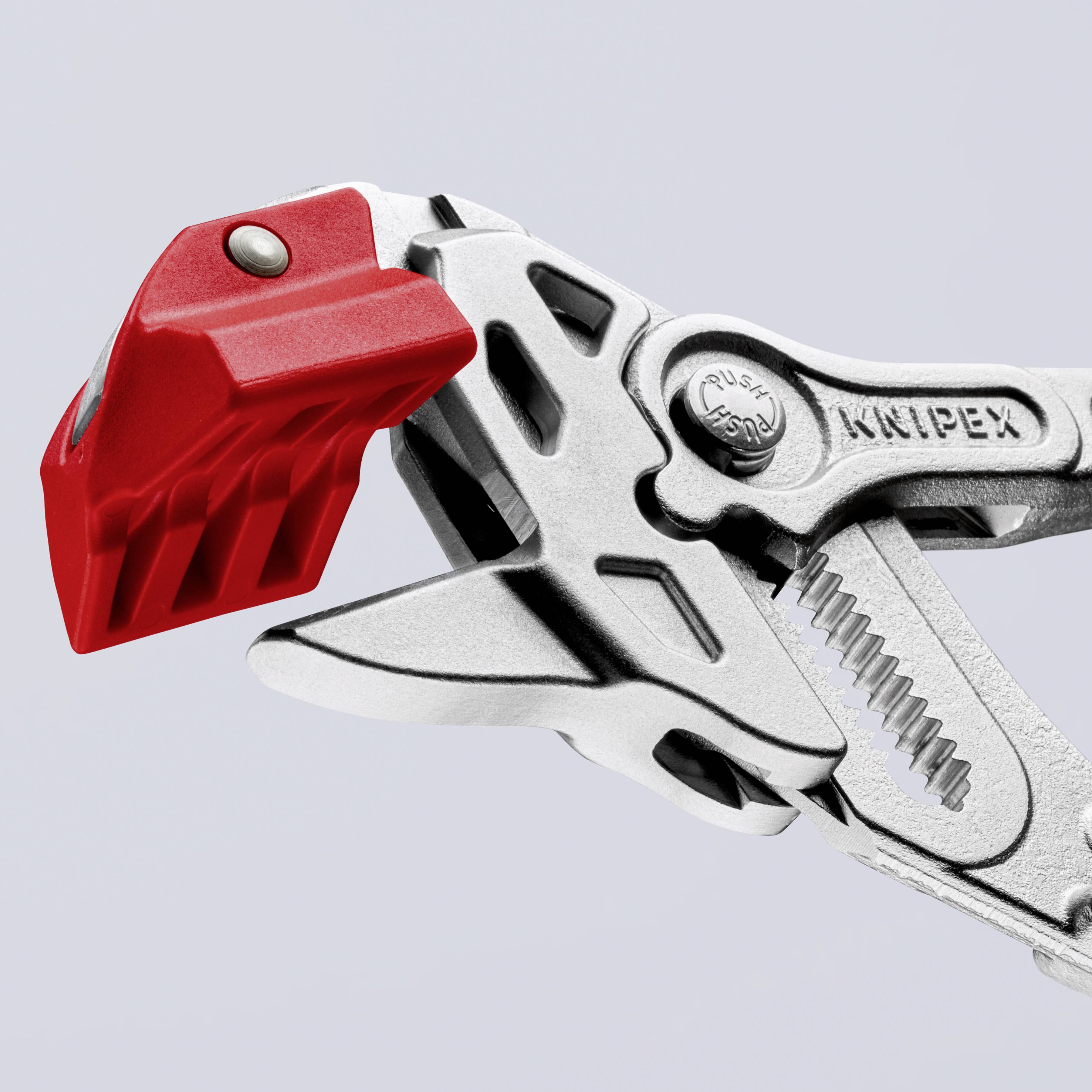 Eine silberne Zange mit rotem Schiebemechanismus, gekennzeichnet mit 'Knipex', zeigt auf die Vielseitigkeit des Werkzeugs.
