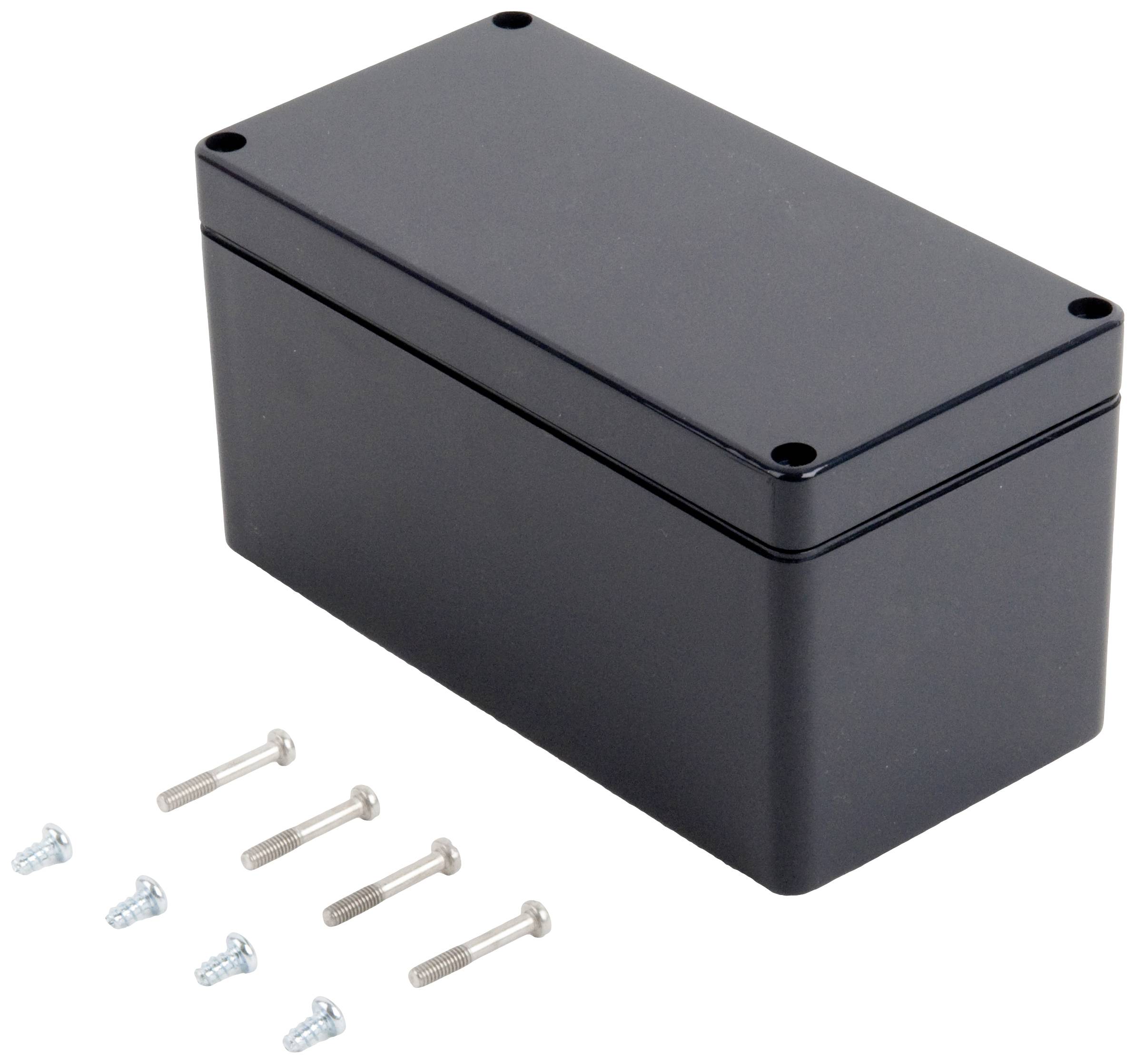Ein rechteckiges, schwarzes Gehäuse mit abnehmbarem Deckel. Daneben liegen sechs Schrauben, drei silberne und drei mit blauer Spitze.