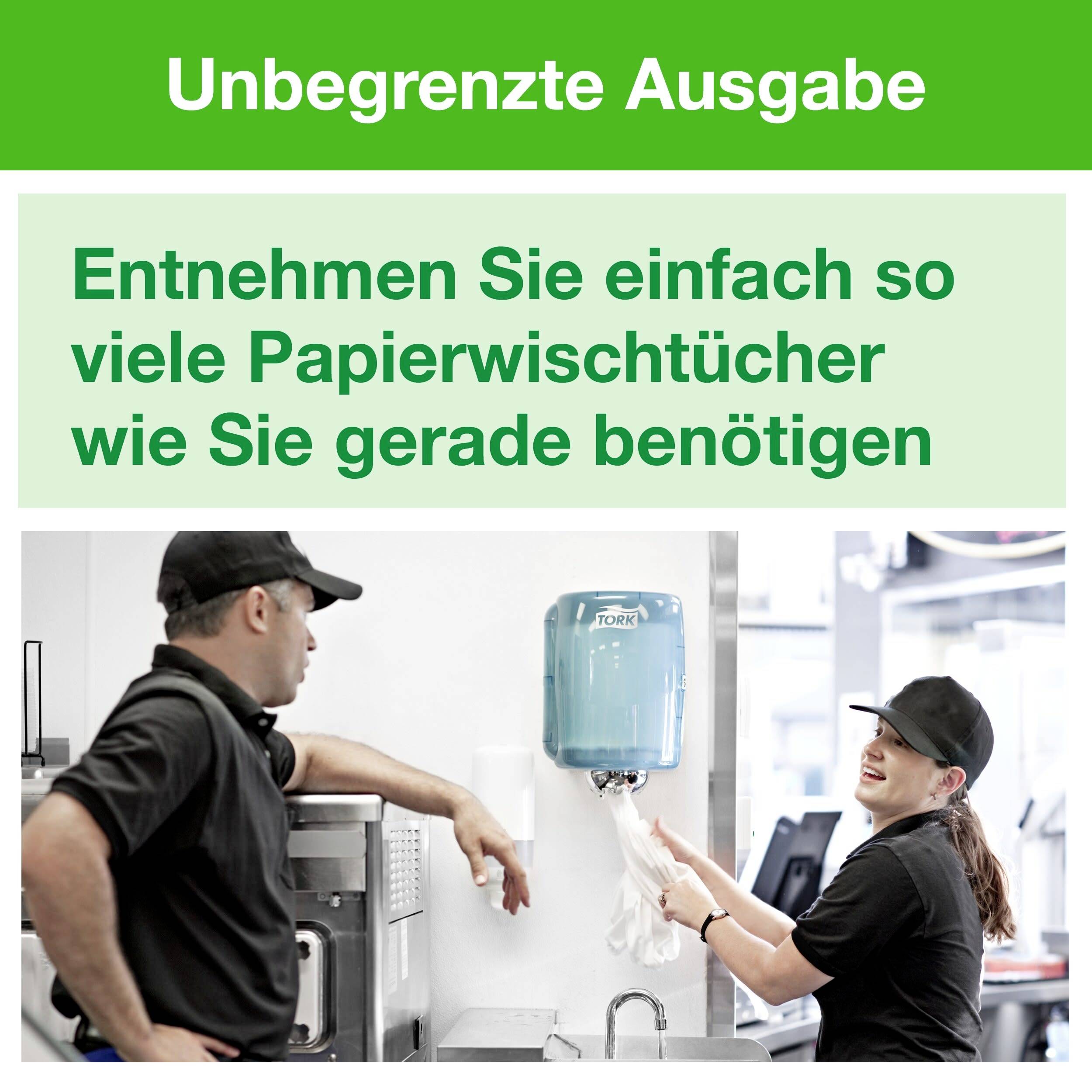 Zwei Personen in Arbeitskleidung neben einem Papierhandtuchspender. Text: 'Entnehmen Sie einfach so viele Papierwischtücher wie Sie gerade benötigen'.