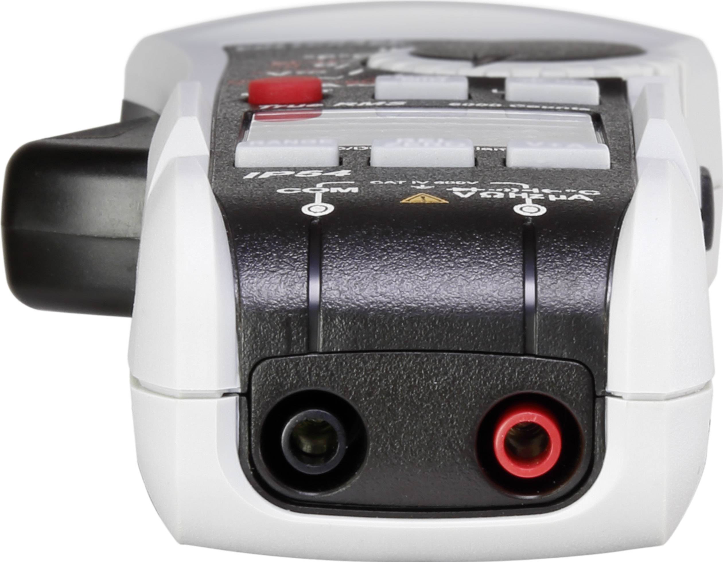 Ein digitales Multimeter mit zwei Messeingangsanschlüssen, gekennzeichnet durch schwarze und rote Buchsen, liegt auf einer Oberfläche.