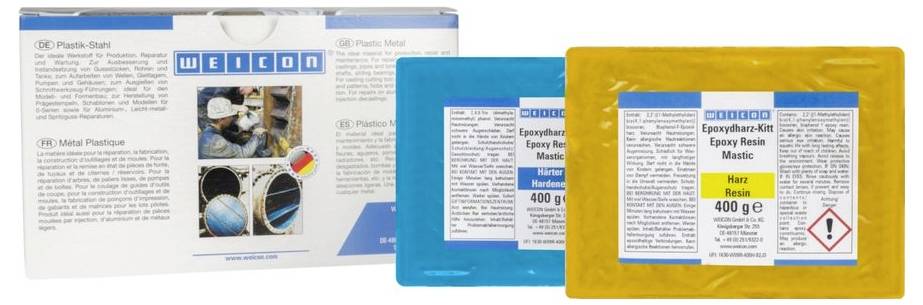 Reparatur-Set für Epoxidharz von WEICON mit Inhalt: Epoxidharz- und Härterpackungen, verwendet für Reparaturen und Oberflächenverklebung.