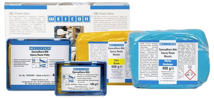 Epoxidharz-Set mit Spachtel, Harz und Härter in beschrifteten Verpackungen. Enthält Gebrauchsanleitung und Produktdetails auf der Verpackung.