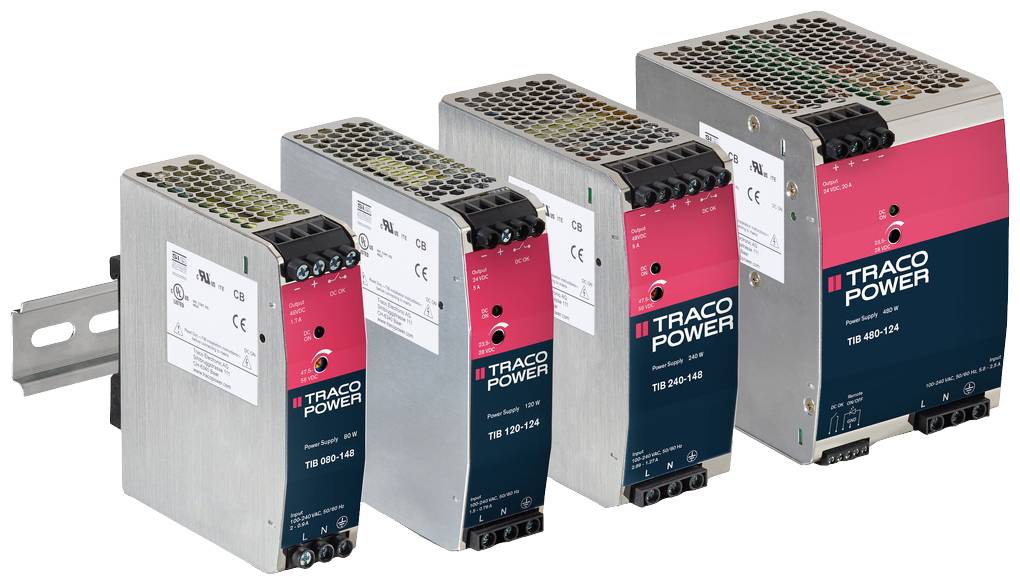 Vier verschiedene TRACO POWER Netzteile in einer Reihe montiert. Jedes Netzteil hat ein Metallgehäuse mit farbigen Etiketten und Anschlussklemmen.