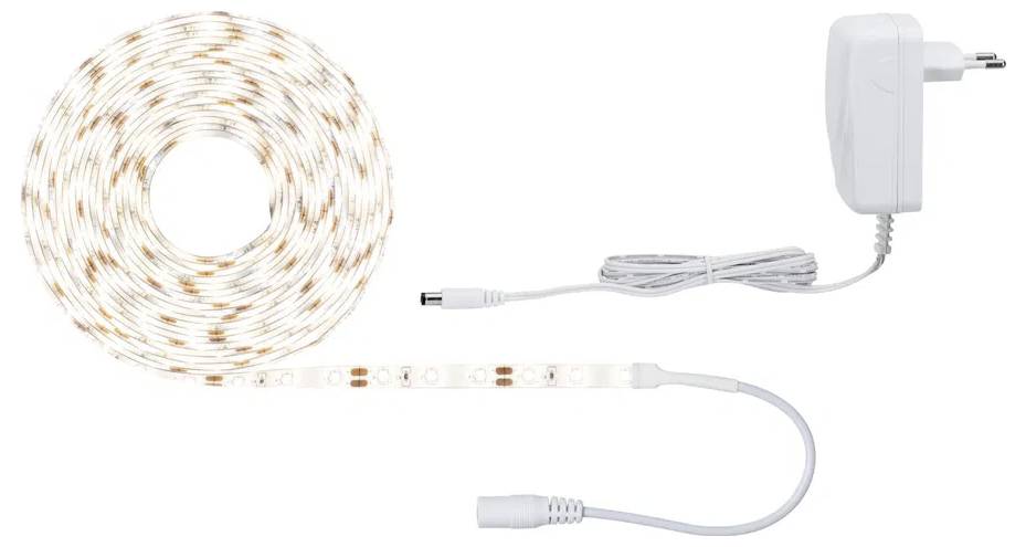 Ein zusammengerollter LED-Lichtstreifen mit Netzteil, bereit zur Verwendung. Ideal zur dekorativen Beleuchtung von Innenräumen.