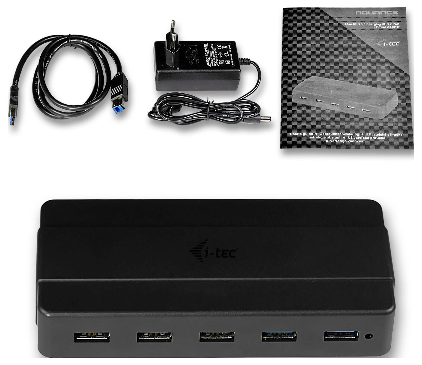 Schwarze elektronische Komponenten in einem Tablett mit perforierten Kanten angeordnet, geeignet für industrielle oder Fertigungszwecke.