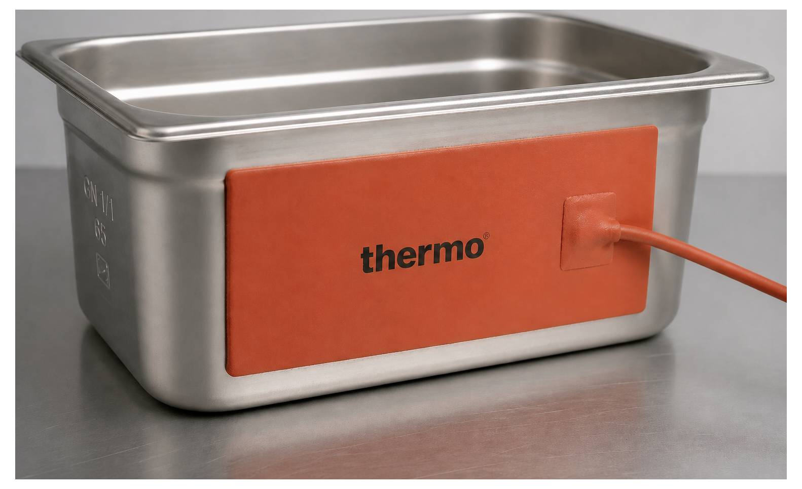 Edelstahlbehälter für Lebensmittel mit einem orangefarbenen „Thermo