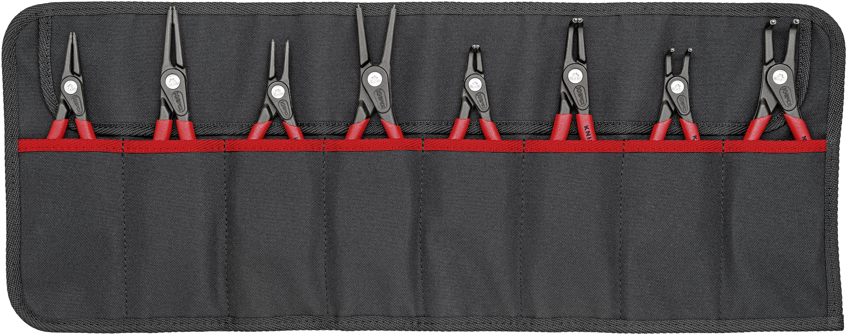 Ein Werkzeugsatz mit acht roten Zangen in einer schwarzen Stofftasche.