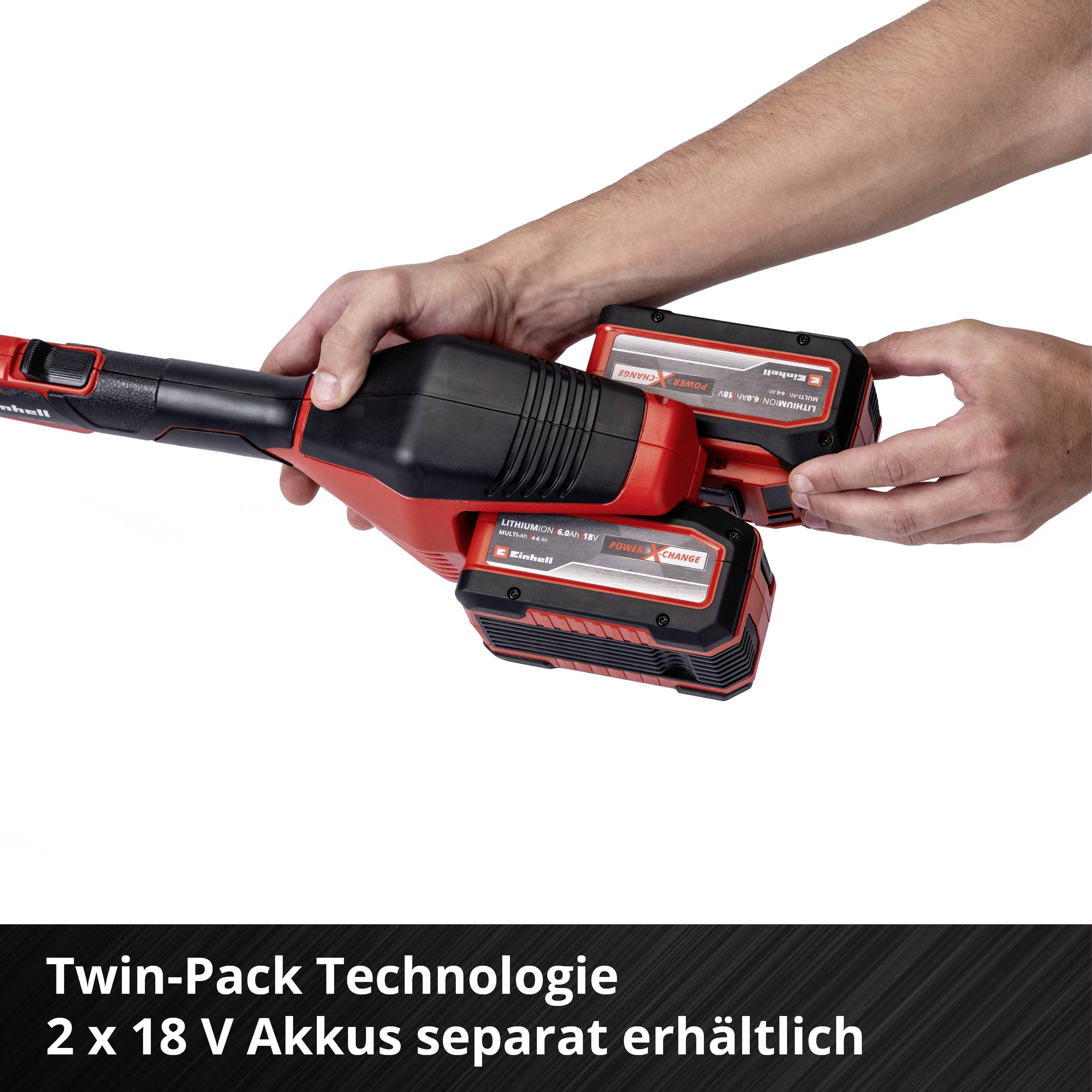 Eine Person hält ein Werkzeug mit zwei eingesetzten Akkus. Text unterhalb: 'Twin-Pack Technologie 2 x 18 V Akkus separat erhältlich'.