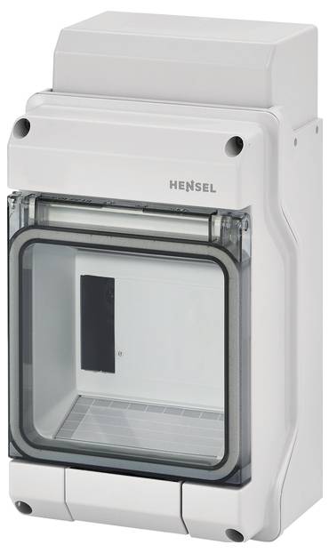 Ein graues, rechteckiges Elektronikgehäuse mit transparentem vorderen Deckel. Markiert mit 'Hensel'. Geeignet für den Schutz von Elektronikbauteilen.