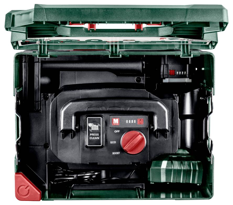 Ein offener, grüner Werkzeugkoffer, der ein elektrisches Werkzeug mit roten Einstellungsreglern zeigt, die mit 